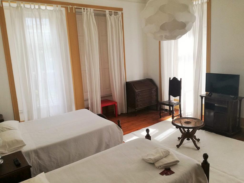 Quarto Triplo com Casa de Banho Privativa